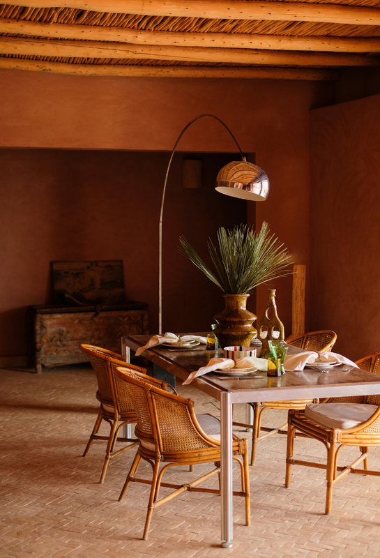 Dinning table with Moroccan ceramics, glasses and tableware