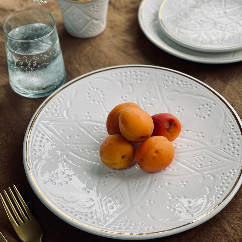 Handmade Moroccan dinner plate in white by Chabi chic with apricots