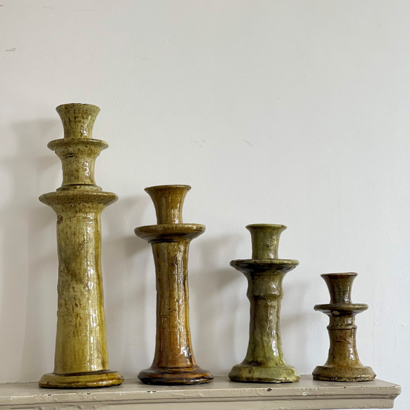 Collection of rustic ochre coloured Tamegroute candle holders