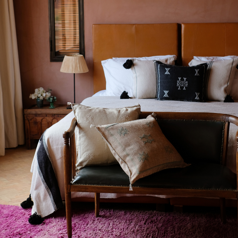 Bedroom with Moroccan Cushions and Throws